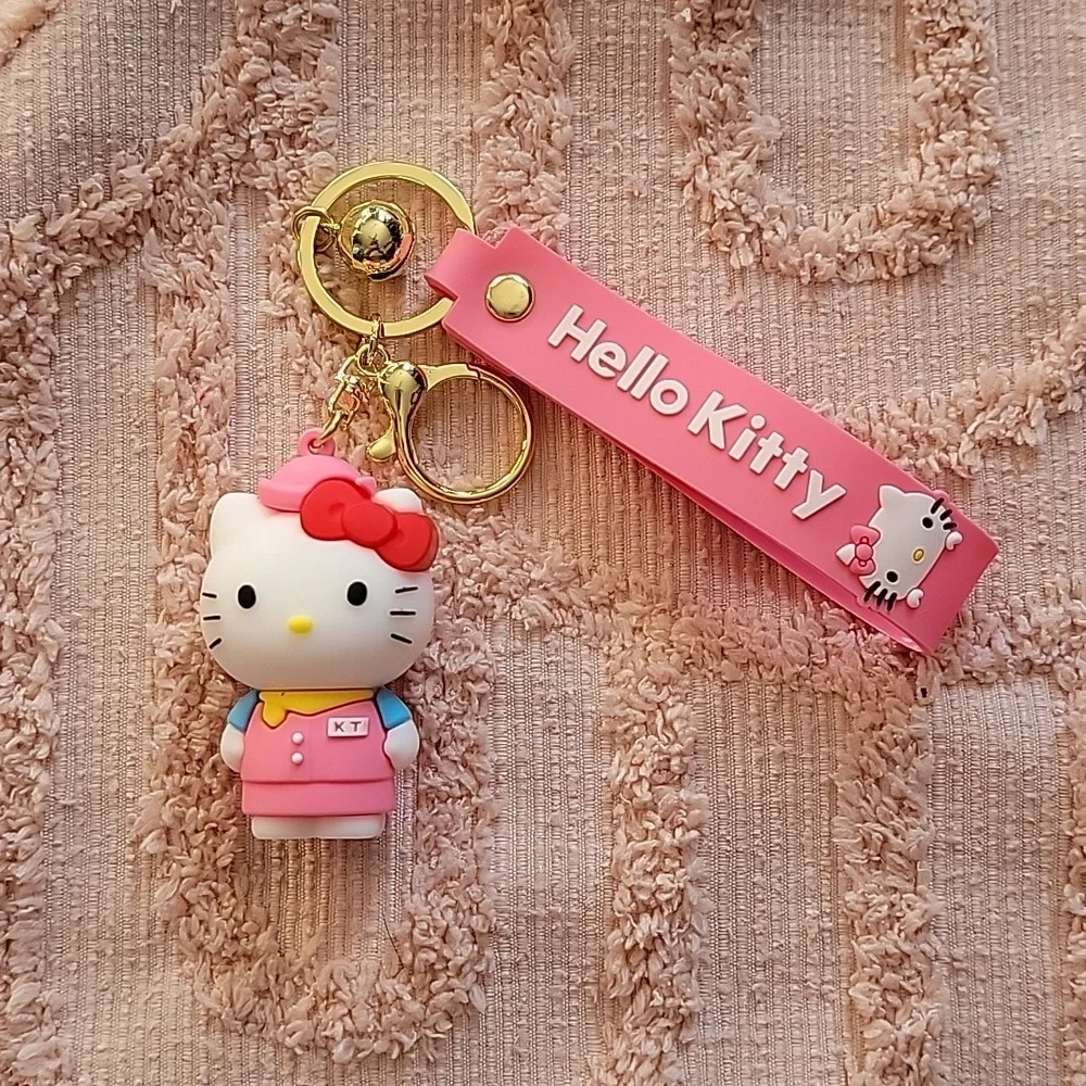 Hello Kitty, silicon keychain. NWOT. Metal hooks, pink and white 💗.